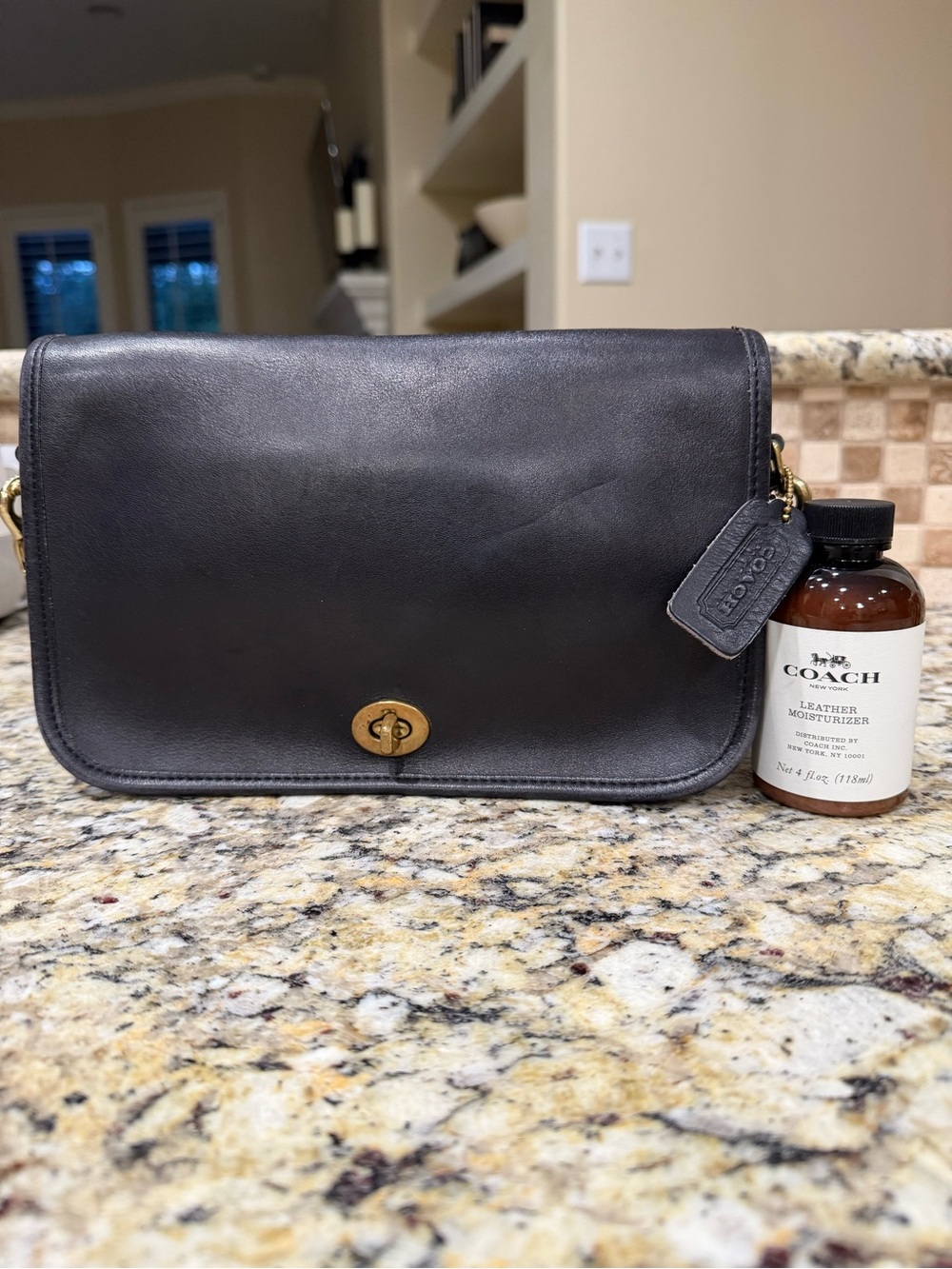 Vintage Black Coach Pocket Purse and Leather Moisturizer
